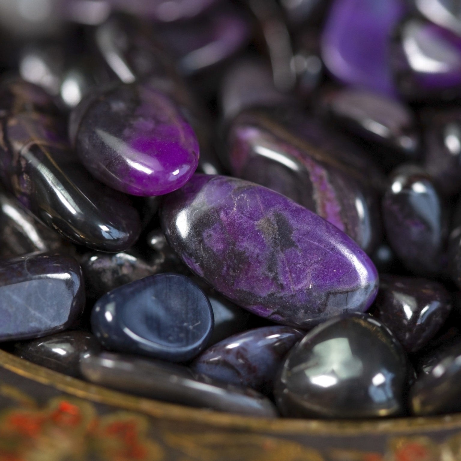 Tumbled Sugilite for a potent dose of healing magic and wellness