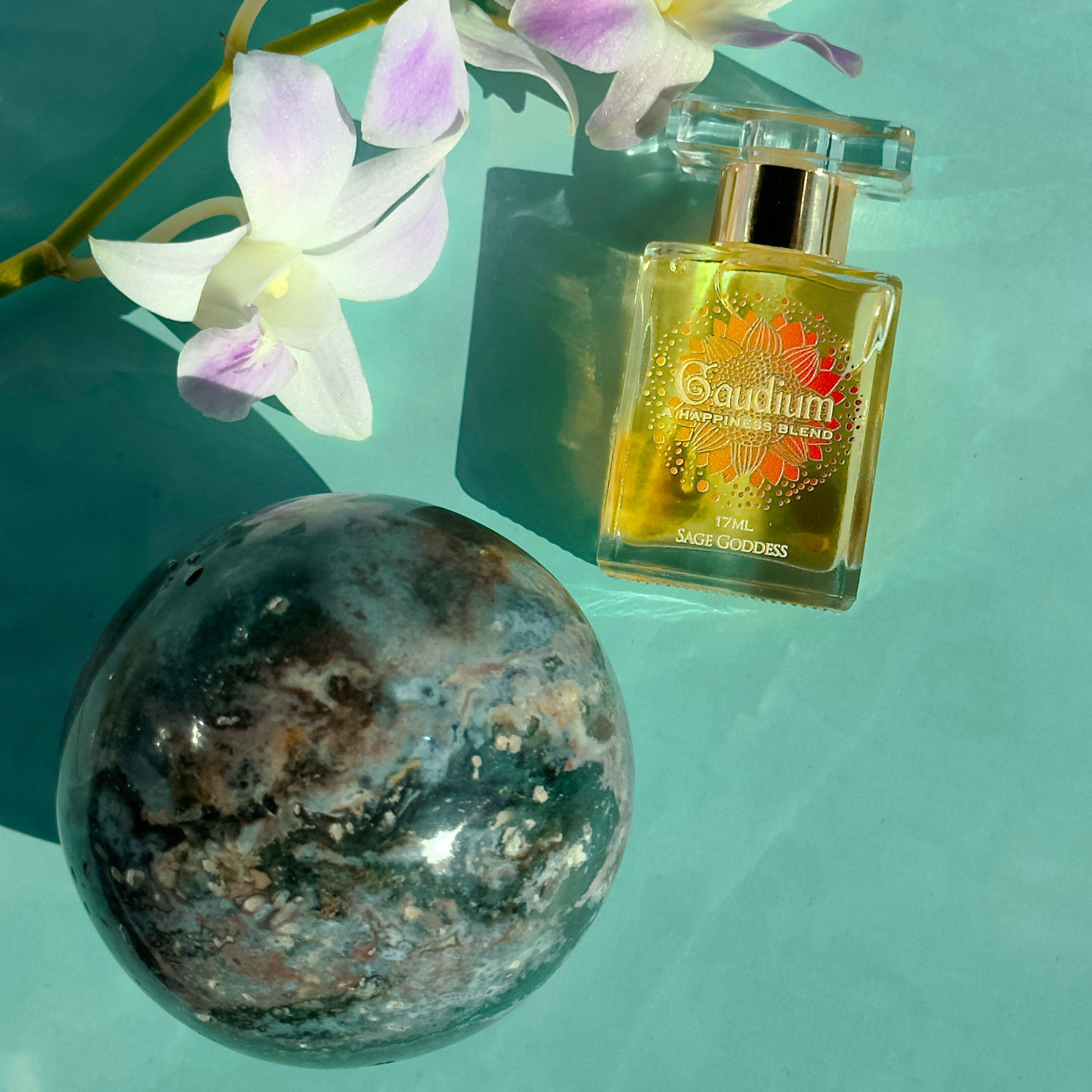 Image of Ocean Jasper Sphere & Gaudium Perfume Duo